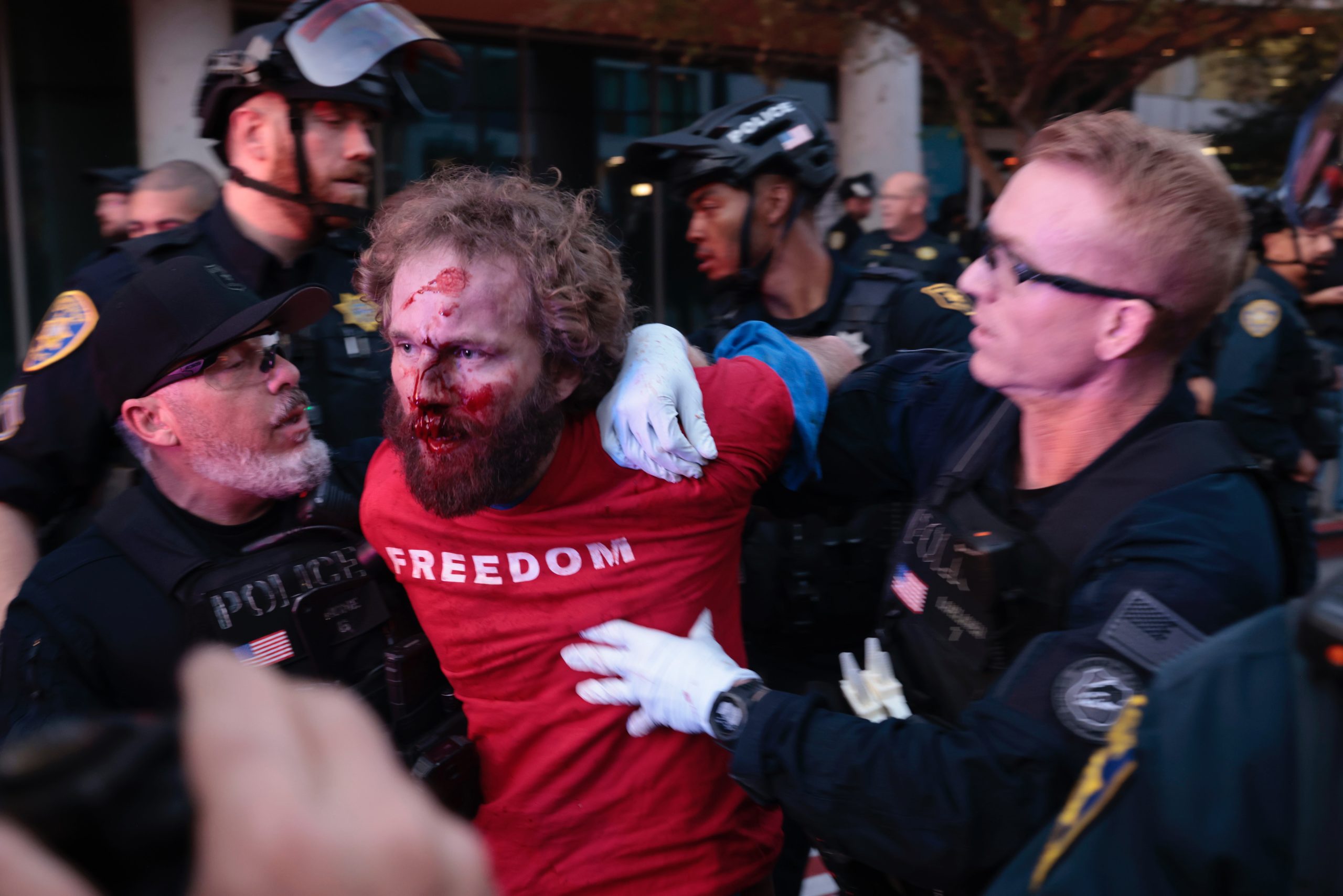 Anti-fascist protesters clash with attendees outside Turning Point event at UC Berkeley