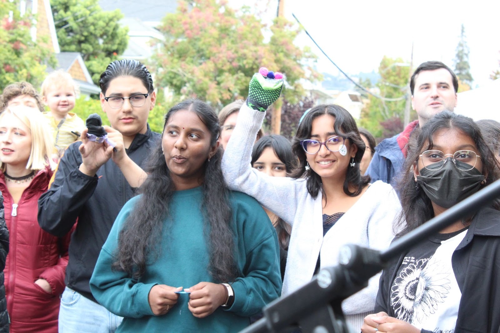 Climate activists gather in Berkeley for chalk painting, drag show and a sock puppet singalong
